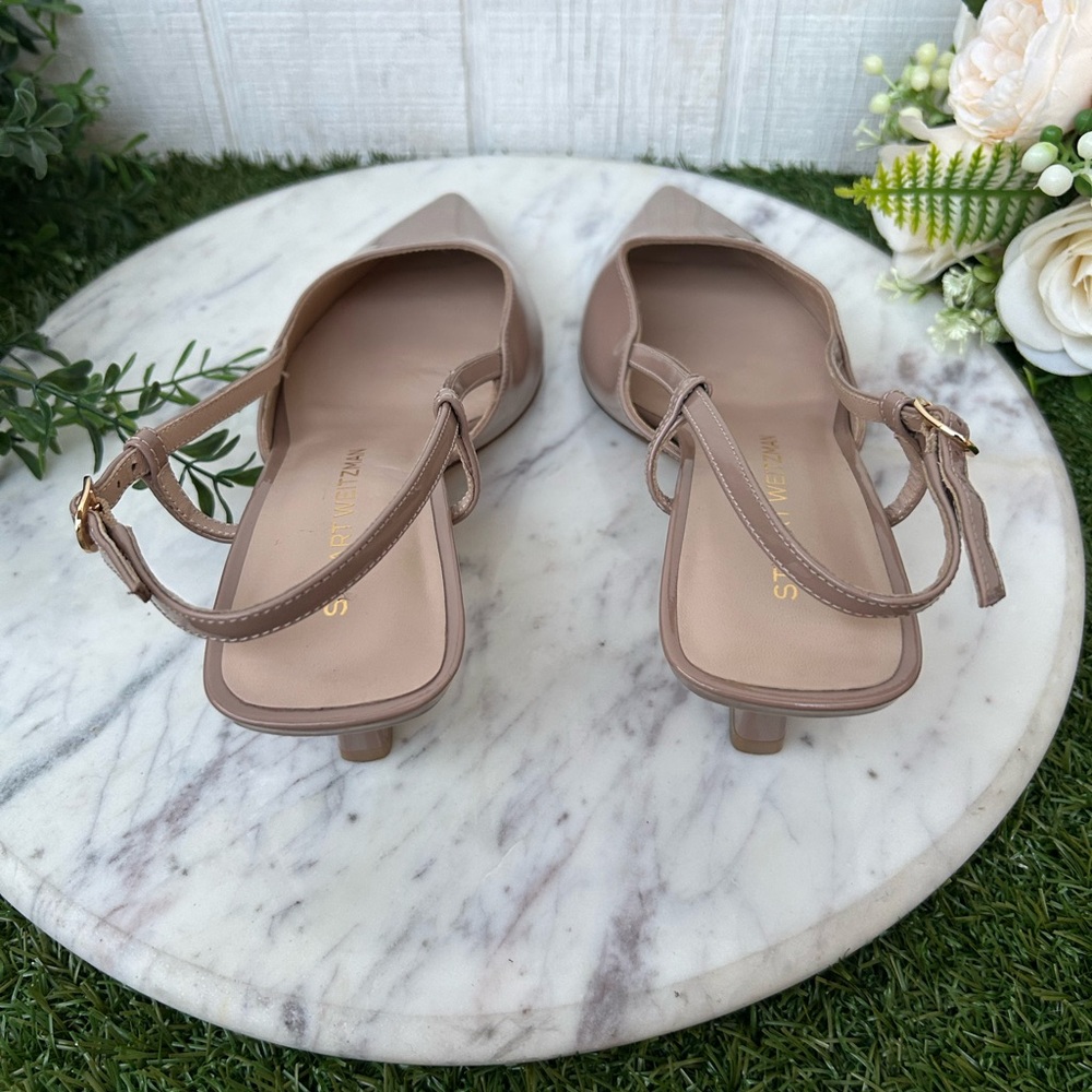 Stuart Weitzman
Vinnie Patent Kitten Slingback Pumps
$525
50mm BEIGE 6.5B NEW - Picture 14 of 16